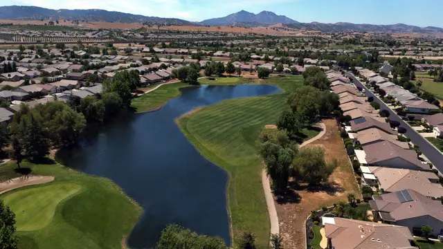 Aerial view of lakeside holes with Mount Diablo beyond