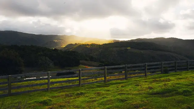 Light breaking over the Carmel Valley Ranch hills
