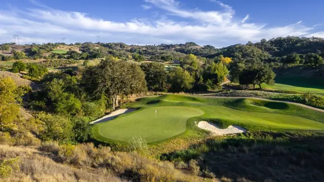 Green set among oaks and chaparral
