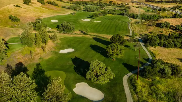 Aerial view of oak-dotted fairways
