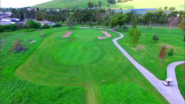 Aerial view of a bunkered green