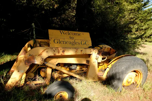Old tractor holding the Welcome to Gleneagles sign