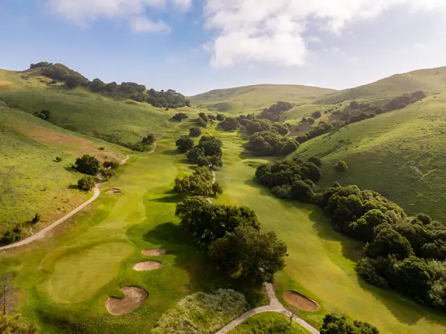 Aerial view of a hole cut into the hillside