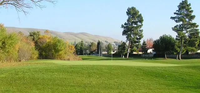 Green below the Hayward hills at Mission Hills