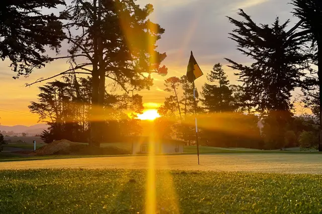 Sunset behind the flag at Pajaro Valley