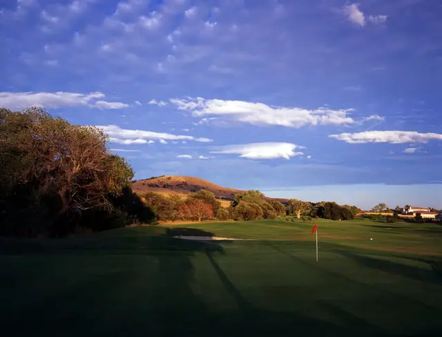 Evening shadows across the course