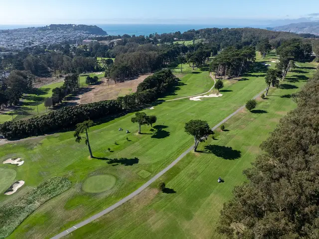 Aerial view over Presidio fairways toward the Pacific