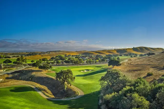 Hole winding through a ravine toward the valley
