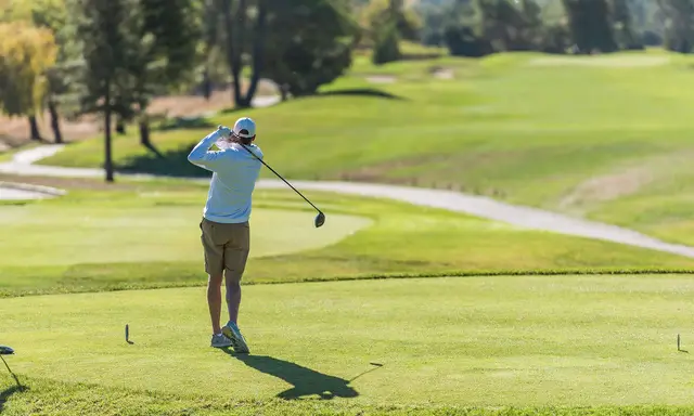 Golfer teeing off on a hole at Sonoma Golf Club