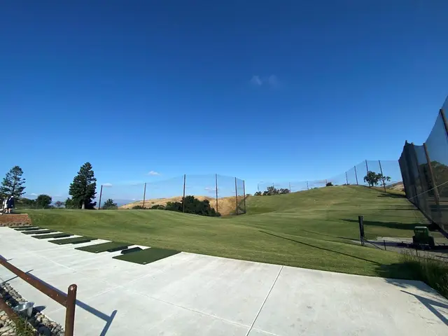 Range tee line under a blue sky