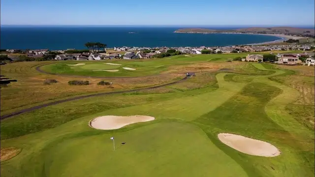 Bunkered green with Bodega Bay and Doran Beach beyond