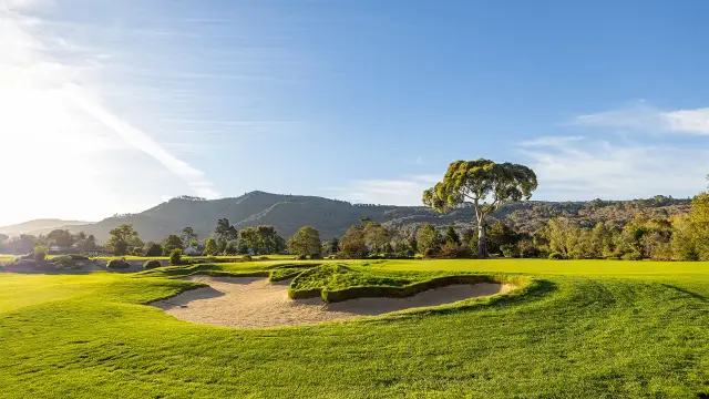 Sculpted bunker with the Santa Lucia range beyond