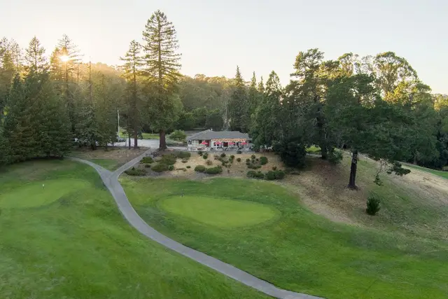 Clubhouse among the pines at sunrise